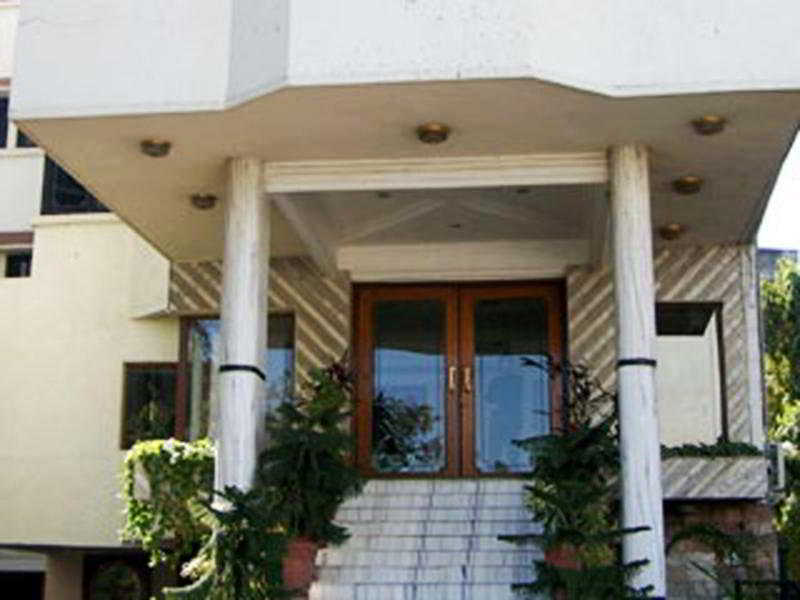 Hotel Chicago Ahmedabad Bagian luar foto